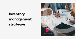 People reviewing charts and graphs during a meeting on inventory management strategies.