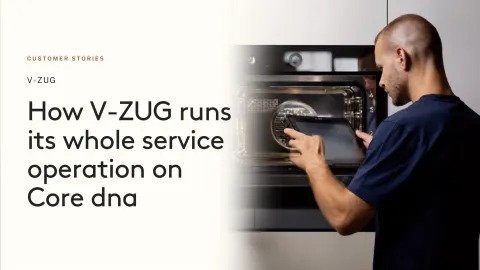 Man using tablet in front of V-ZUG appliance, showcasing service operation on Core dna.