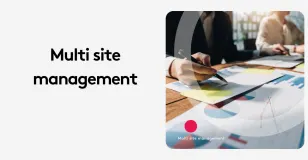 Business meeting with charts and graphs for multi site management.