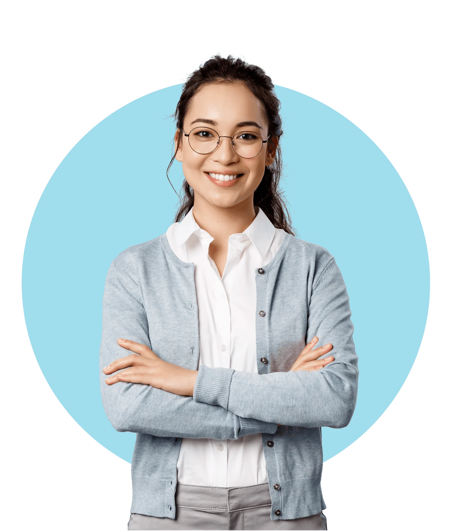 Woman in glasses smiling with arms crossed on blue background.