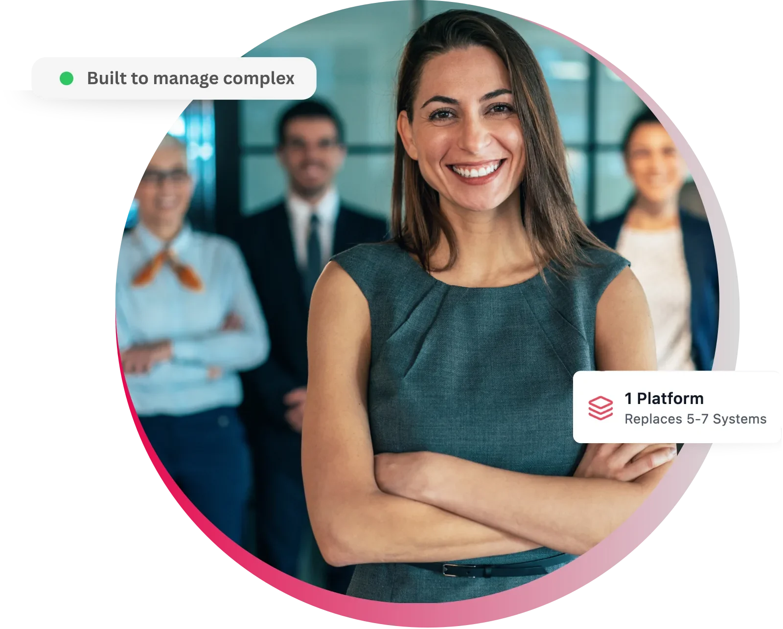 Smiling businesswoman stands confidently with team in office setting.